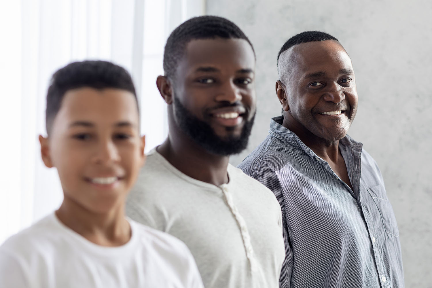 Multi Generational Male Family. Portrait Of Smiling Black Son, Father And Grandfather Standing In A Row And Looking At Camera, Closeup